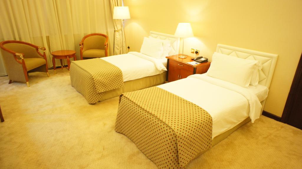 Gloria Hotel Doha Værelse billede